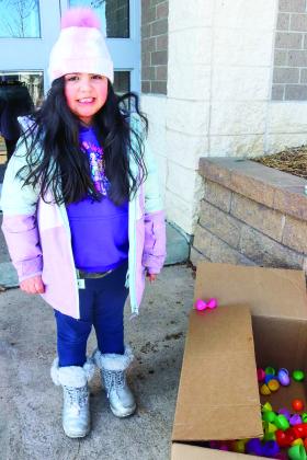 The Redgranite Lions Club laid out 1,000 eggs for the Redgranite Easter Egg Hunt on March 23. Mireya Duarte collected several of her own, and helped return her eggs after taking her treats and prizes. 