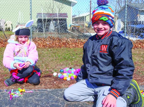 Greta and Charlie Regan collected eggs filled with candy during the Redgranite Easter Egg Hunt on March 23. The Redgranite Lions Club sponsor the event each year at the elementary school. 