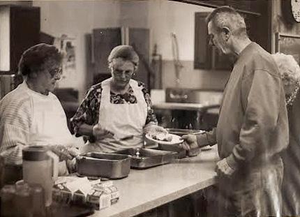 Arnold Williams and Kay Walters at the Wautoma Meal Site in the 90s. 